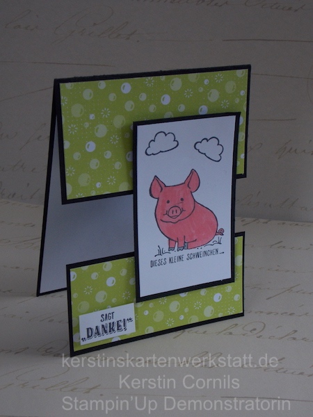 Eine Grußkarte mit Reststücken und Schweinchen