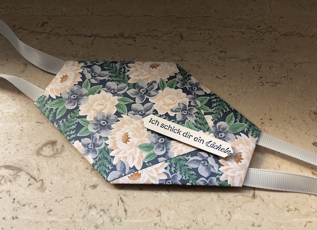 Gesichtsmaske als Goodie aus Papier