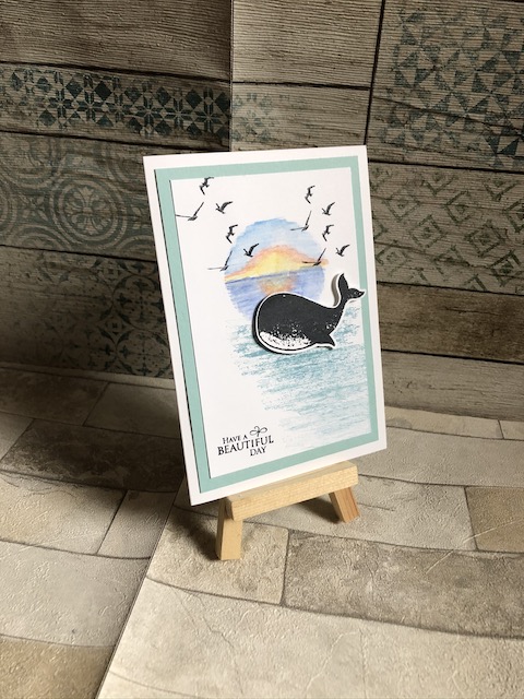 Grußkarte mit Sonnenuntergang, der erst mit den Aquarellstiften von Stampin' Up gemalt wurde und dann mit einem Wassertankpinsel in Form gebracht wurde.