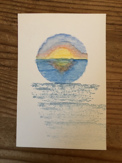 Grußkarte mit Sonnenuntergang, der erst mit den Aquarellstiften von Stampin' Up gemalt wurde und dann mit einem Wassertankpinsel in Form gebracht wurde.