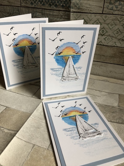 Grußkarte mit Sonnenuntergang, der erst mit den Aquarellstiften von Stampin' Up gemalt wurde und dann mit einem Wassertankpinsel in Form gebracht wurde.