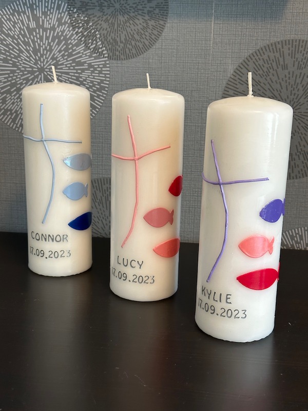 Drei selbst gestaltete Taufkerzen von Kerstins Kartenwerkstatt für drei Geschwisterkinder