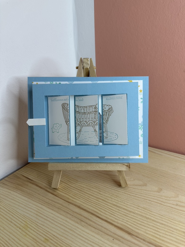 Sliderkarte zur Geburt eines Jungen mit Babywiege