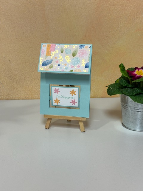 Zu sehen ist eine Karte mit drehendem Bild. Farblich ist sie passend zum Frühling gestaltet.