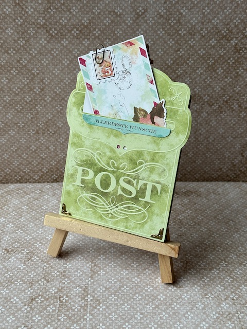 Selbst gebastelte Karte in Briefkastenoptik mit kleinem Brief, der in den Briefkastenschlitz gesteckt ist. Material alles von Stampin Up